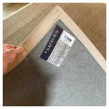 SAFAVIEH WOVEN RUSH CARPET | With a beige canvas border, label to under side; 10 ft. x 7 ft. 10 in. 