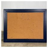 BLUE FRAMED CORKBOARD | Cork / bulletin board in a navy blue painted frame; overall 34 x 44 in. 