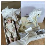 Amy sculpted by Jane Zidjunas with accompanying rocking horse