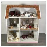 DOLLHOUSE & FURNITURE | Pink colonial dollhouse with shingle roof (h. 28 x w. 27 x d. 19 in.) with d