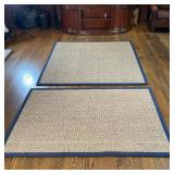 PAIR SAFAVIEH CARPETS | Woven rush carpets, each with navy blue canvas borders, including a 6 ft. x 