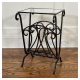 GLASS TOP MAGAZINE RACK TABLE | Wrought iron frame with scroll decorations and a glass top; h. 24 x 