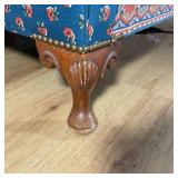 With carved shell knees on short cabriole legs