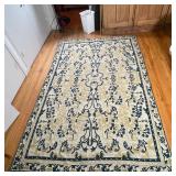 FLAT WOVEN AREA RUG | Navy blue and gold woven pattern within a key motif border; 9 ft. 1 in. x 5 ft