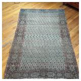 ANTIQUE FLAT WOVEN RUG | Having an overall pattern within a floral motif border; 6 ft. 4 in. x 4 ft.