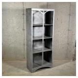 METAL BOOKCASE | Brushed metal open bookshelf, having 4 shelve behind an arched dividing accent over