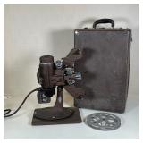 FILMO MASTER PROJECTOR | Vintage Filmo "Master" projector in a conforming velvet-lined box with...