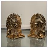 PAIR NATIVE AMERICAN BOOKENDS | Polished brass / heavy metal bookends, each in the form of a bust of