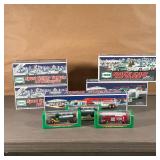 (8pc) MISC. BOXED HESS TRUCKS | All new in boxes, including 2 Sport Utility Vehicle and Motorcycles 