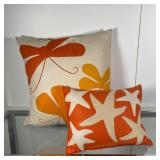 (2pc) HABLE THROW PILLOWS | Decorative throw pillows, including a small orange pillow with cream