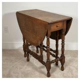 OVAL DROP SIDE TABLE | With a single drawer; 28 x 13 x 32 in. 