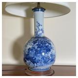 CHINESE BULBOUS LAMP | White porcelain decorated with blue underglaze, mounted to a wood stand