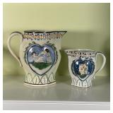 (2pc) PRATTWARE PITCHERS | Showing children playing in heart-form reserves; large pitcher h. 7 x 8