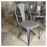  dining side chairs with subtle grey quartz mineral color enamel finish, with tack-like seat accents