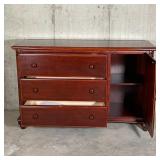 SOLID WOOD DRESSER | Three stacked drawers flanked by a side cabinet, with some carved accents