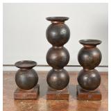(3pc) JAN BARBOGLIO CANDLEHOLDERS | Heavy! A matching set of graduated cast iron candle holders on s