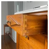 white marble top over three drawers solid wood construction with dovetailing: h. 48 x w. 24 x d. 16-