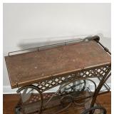 two shelves with glass inserts, and spokes wheels with rubber; 38 x 41 x 20 in.