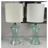 PAIR GREEN GLASS LAMPS | Open "hurricane shade" form bases, excellent condition; h. 25 x dia. 10 in.