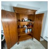 continental style with two doors, interior shelves and a rod for hanging; 83-1/2 x 52 x 23 in.