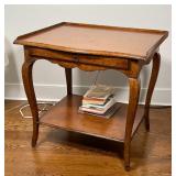 FRENCH STYLE SIDE TABLE | Having a three quarter gallery top above a single drawer with an open lowe