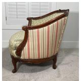 BARREL BACK SLIPPER CHAIR | the crestrail and arms with extensive carvings; 32 x 31 x 34 in.