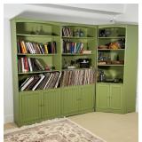 GREEN BOOKSHELF CABINET | In two sections, including a long double cabinet (h. 72 x 64 x 14 in.) and