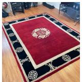 CHINESE STYLE WOOL CARPET | Deep red field, central shou characters with greek key border; 11 ft. 6 