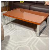 CONTEMPORARY LOW TABLE | Wood with glass top over metal frame; 14 x 27 x 43-1/4 in.