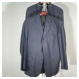 LOT OF 2 CHRISTIAN DIOR SUITS | Both 2-piece suits made in Argentina; black with pinstripes and soli