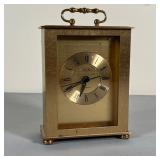 ELGIN CARRIAGE CLOCK | Elgin quartz carriage clock in a brass case, the face with Roman numeral mark
