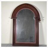 WOOD FRAME MIRROR | Having a domed top; 34-1/2 x 24 in. [missing drop finial on the left]