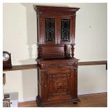 ANTIQUE OAK STEP-BACK CUPBOARD | Late 19th/Early 20th century storage cupboard, highly carved with a