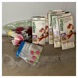 MISC. BAKING ACCESSORIES | Bag of assorted cookie cutters and unopened packages of decorating bags