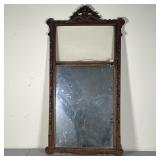 ANTIQUE GLASS & MIRROR | Glass panel over mirror in an intricate carved wood frame; 39 x 21 in.