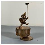 WIND UP MUSIC BEAR | Brass wind-up toy featuring a circus bear; winds up, plays music and spins; h. 