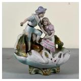 AMOROUS COUPLE DISH | Figures of a boy and girl over a bowl with a pair of swans; h. 7-1/2 x 6-1/2 i