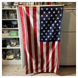AMERICAN FLAG | On an aluminum pole with gilt eagle finial; has 50 stars; flag 32 x 58 in.; pole len