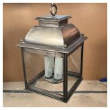  pendant light by Troy Lighting, having four lights inside the solid brass frame with clear glass si