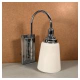 PAIR WALL SCONCES | Polished chrome base with gooseneck arm supporting a milk glass shade; h. 13 x d