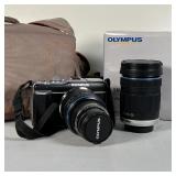 Lowepro carrying case, and original box and instruction booklets; tested and turns on, display works