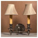 DOUBLE LIGHT WALL SCONCE | Brushed chrome wall scone having two lights each with a beige thread shad