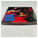 Barry Manilow Greatest Hits; Glass Houses by Billy Joel; and Sing It Again Rod by Rod Stewart, in a 