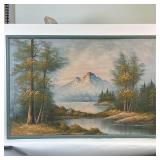 MOUNTAINOUS LANDSCAPE PAINTING | Oil on canvas, wooded landscape painting showing two lakes before a