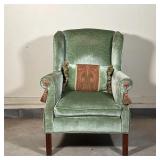 green velvet with tassels on the handholds and a matching pillow; h. 41 x w. 31 x d. 28 in. [appeari