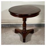 turned pedestal base raised on a tripod platform, appears to be in very good condition; h. 31 x dia.