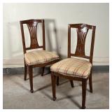 PAIR ANTIQUE SIDE CHAIRS | With carved crestrails, having upholstered seats over carved tapering squ