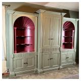 Small Bone cabinetmakers; outset central double cabinet doors flanked by open red-painted cove books