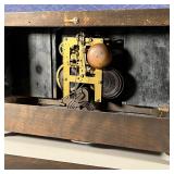 FAUX MARBLE CLOCK | The face with Arabic numerals, flanked by decorative columns; h. 11 x w. 18 x d.