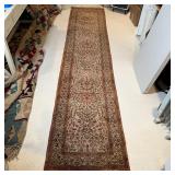 PERSIAN RUNNER | Flowery devices on a beige field, hand made and appearing in very good condition; 1